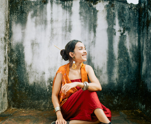 Portrait of an Indonesian woman in a traditional garment, smiling
